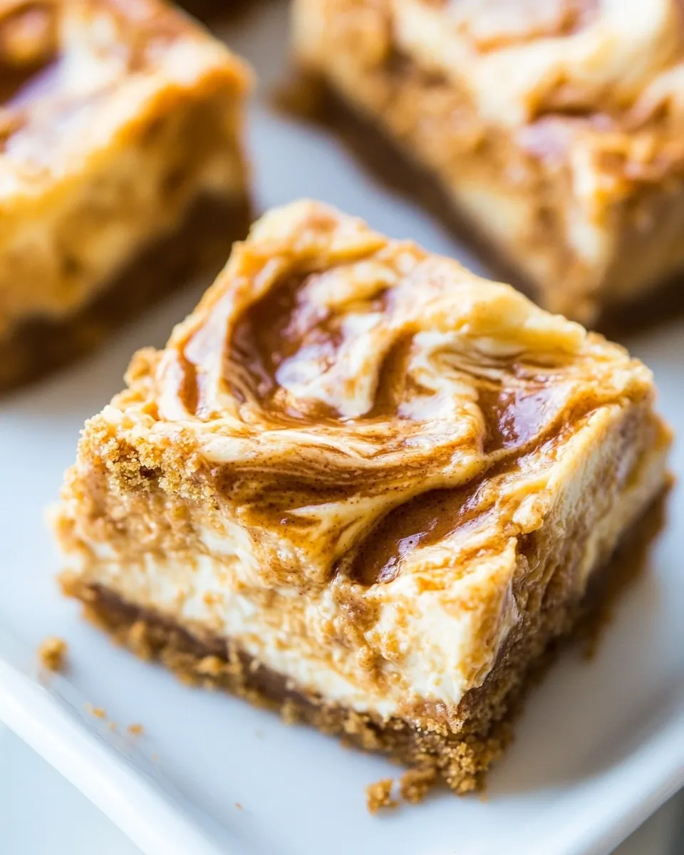 Easy Peanut Butter-Swirled Cheesecake Bars with Brown Sugar-Graham Cracker Crust recipe photo