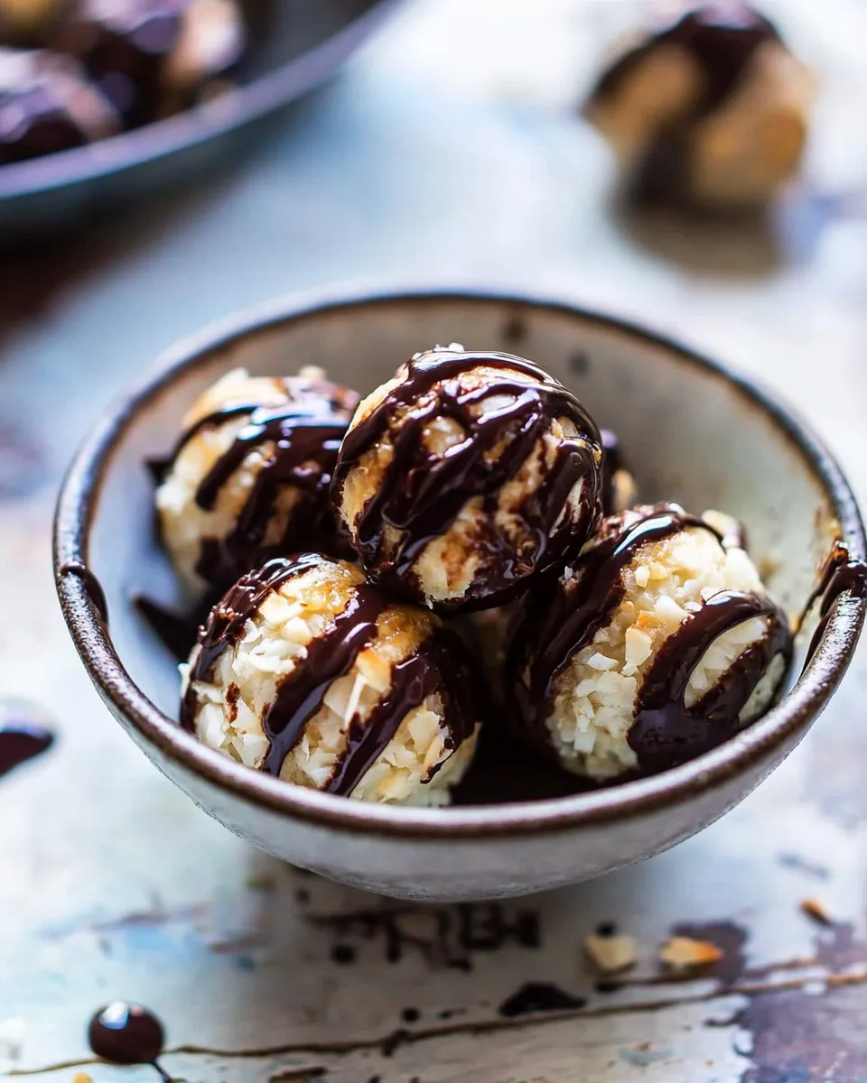 Ultimate Sweet Cuban Coconut Balls with Melted Chocolate (Coquito Acaramelado). food shot